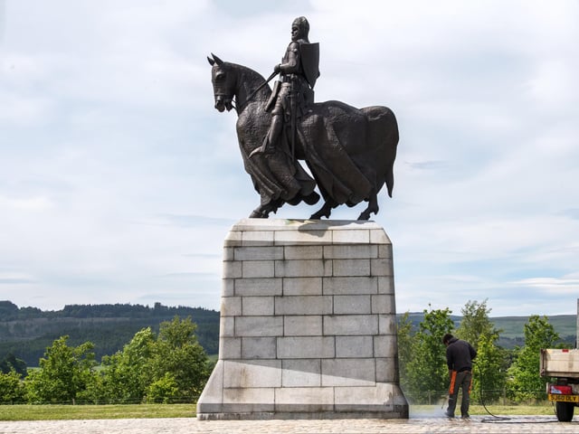 The statue of King Robert the Bruce at Bannockburn has been graffitied with messages calling for the monument to be removed.