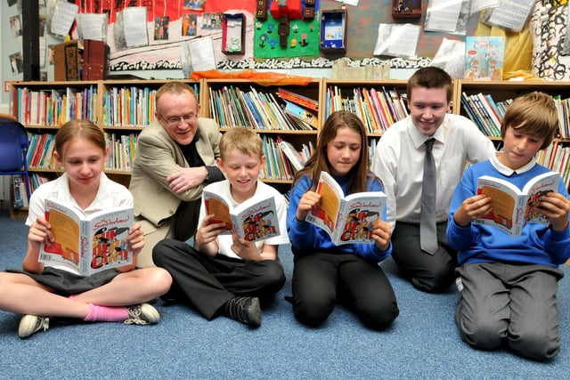 David Simpson (rear, left) and Richard Callaghan, authors of "My Sunderland", dropped into Grangetown Primary School to hand out copies of their book to the students. Pictured with David and Richard are, from left: Megan Walton, Andrew ScottKayleigh Craik and Liam Crawford in 2011.