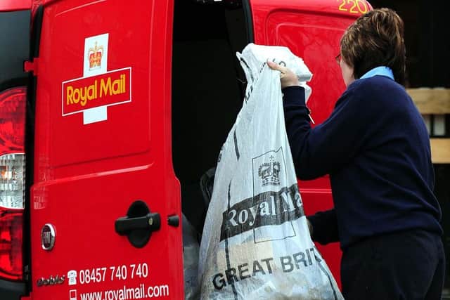 Over 115,00 postal workers are expected to strike in the next four weeks after rejecting a 'pay offer with strings'. (file photo by Rui Vieira/PA Wire)