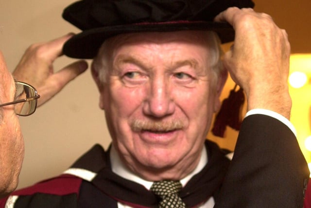 Sheffield football legend Derek Dooley is seen being prepared to receive his honorary doctorate at a Sheffield Hallam University degree ceremony in 2003