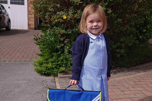 Hannah Wallace, on her way to school for the very first time.