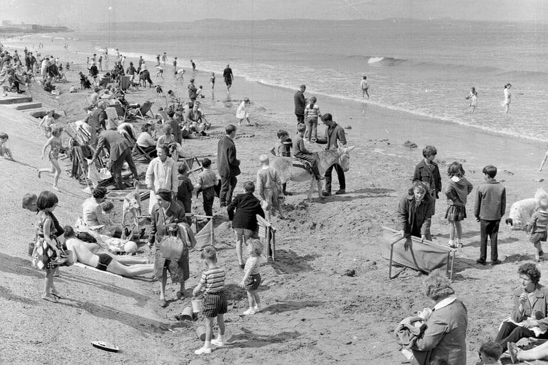 Beach visitors vie for a prime spot on Portobello Beach in 1965.