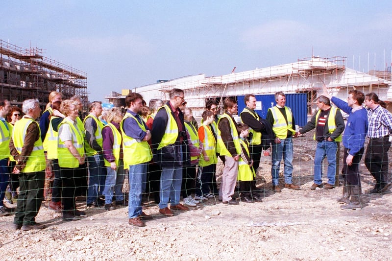 Earth Centre members got a sneak preview of the planet earth galleries phase one building at the Conisborough site in 1999, here the members are being guided by centre researcher Simon Pinnegar, pictured right.