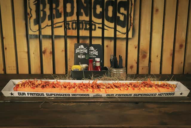 The three-foot hotdog at Broncos Rodeo Bar and Grill in Sheffield.