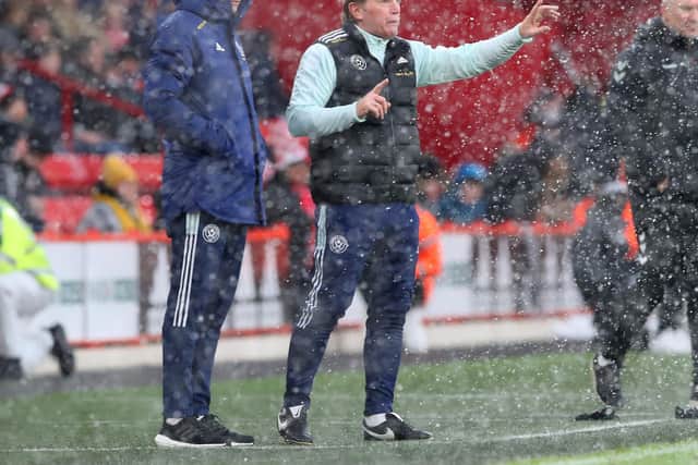 Paul Heckingbottom and Stuart McCall direct the players  during the Sky Bet Championship match at Bramall Lane against Bristol City: Simon Bellis / Sportimage
