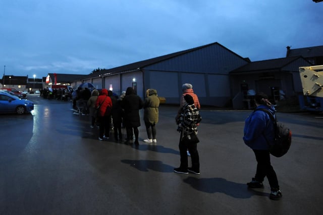 All wrapped up - the queue which snaked through the car park before the doors opened this morning (Pic: Fife Photo Agency)