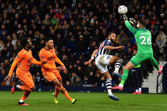 Newcastle United's English goalkeeper Karl Darlow (R) saves a chance from West Bromwich Albion's English-born Scottish midfielder Matt Phillips during the English FA Cup fifth round football match between West Bromwich Albion and Newcastle United at The Hawthorns stadium in West Bromwich, central England, on March 3, 2020. (Photo by Paul ELLIS / AFP) / RESTRICTED TO EDITORIAL USE. No use with unauthorized audio, video, data, fixture lists, club/league logos or 'live' services. Online in-match use limited to 120 images. An additional 40 images may be used in extra time. No video emulation. Social media in-match use limited to 120 images. An additional 40 images may be used in extra time. No use in betting publications, games or single club/league/player publications. /  (Photo by PAUL ELLIS/AFP via Getty Images)