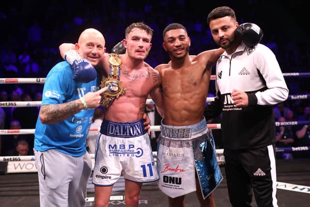 Dalton Smith (second left) celebrates victory against Kaisee Benjamin (second right) in the BBBofC British Super Light-weight bout at the AO Arena, Manchester: Ian Hodgson/PA Wire.