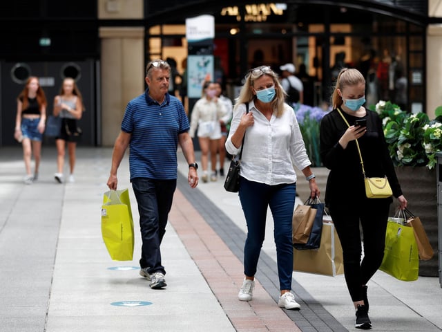Shoppers wearing face masks at Gunwharf Quays