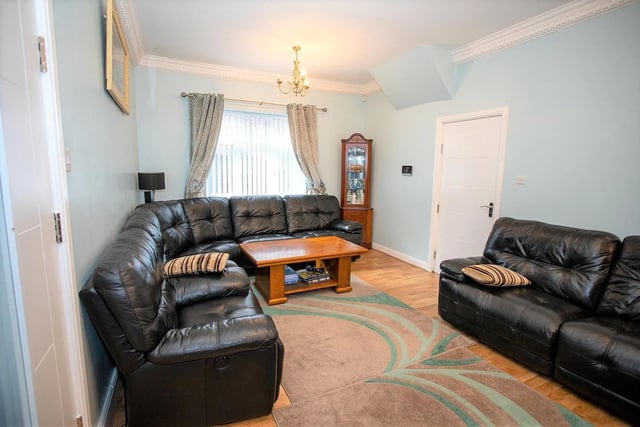 A further reception room offers lots of space to relax.