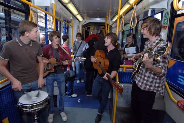 Local indie band Paperdots (from left ) Anthoney Barlow; Scott Howes; James Leazely and Jonathan Birch launching the Tramlines Music Festival by playing on the Supertram in Sheffield City Centre