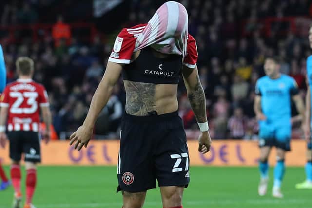 Morgan Gibbs-White of Sheffield United reacts to being sent off against Millwall, ruling him out of Sunday's derby clash at Barnsley: Simon Bellis / Sportimage