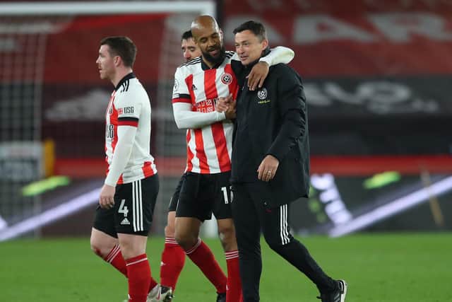 Sheffield, England, 24th April 2021. David McGoldrick of Sheffield Utd and Paul Heckingbottom interim manager of Sheffield Utd enjoy the win during the Premier League match at Bramall Lane, Sheffield. Picture credit should read: Simon Bellis / Sportimage