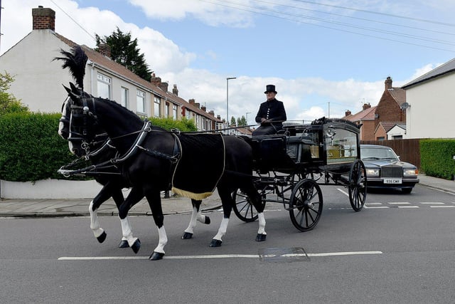 The cortege was led by a horse-drawn carriage. Picture by FRANK REID