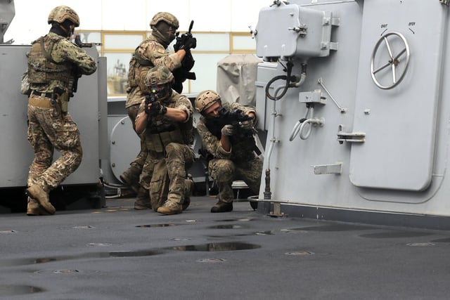 Ukrainian boarding team on board HMS Dragon.