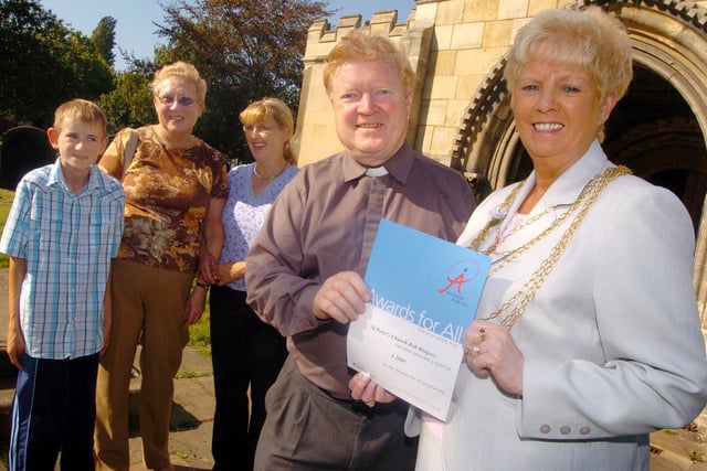 Councillor Nora Troops, Doncaster Civic Mayor, presented a £2000 grant certificate from Lottery Grants for local groups to Alan Griffiths, vicar at St Peter's Church. The grant was for refurbishment work to the church bells. Pictured with bellringers L-R Matthew Wood, Margaret Boldry and Mary Wood