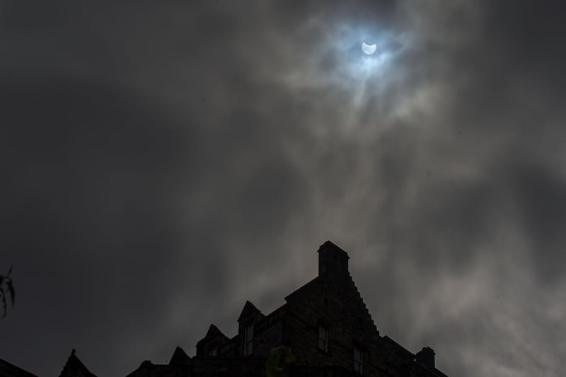 The UK saw its first solar eclipse in more than six years during the morning of Thursday June 10, when the sun was partially covered by a New Moon. Here's a picture of it taken from Princes Street Gardens with views of Edinburgh Castle.