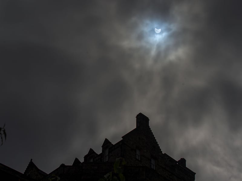 The UK saw its first solar eclipse in more than six years during the morning of Thursday June 10, when the sun was partially covered by a New Moon. Here's a picture of it taken from Princes Street Gardens with views of Edinburgh Castle.