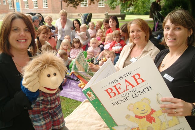 A Picnic and storytelling day was held for children at Worksop Library in 2007. Front L-R: Una Daniel (Surestart), Jackie Collins (Manton Children's Centre) & Katy McNicholas (Library Services, Bookstart Developement Worker).