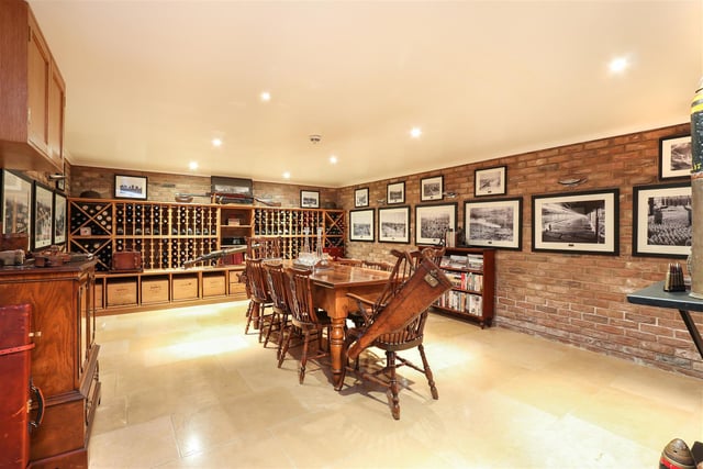 Accessed by the hall’s beautiful feature spiral staircase the room has plenty of room to store your collection of wine.