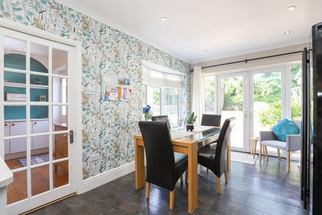 The light and airy dining area is perfect for hosting dinner parties and looks out over the rear garden.