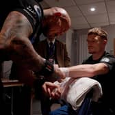 Getting ready - Jamie Sheldon wraps Dalton Smith's hands