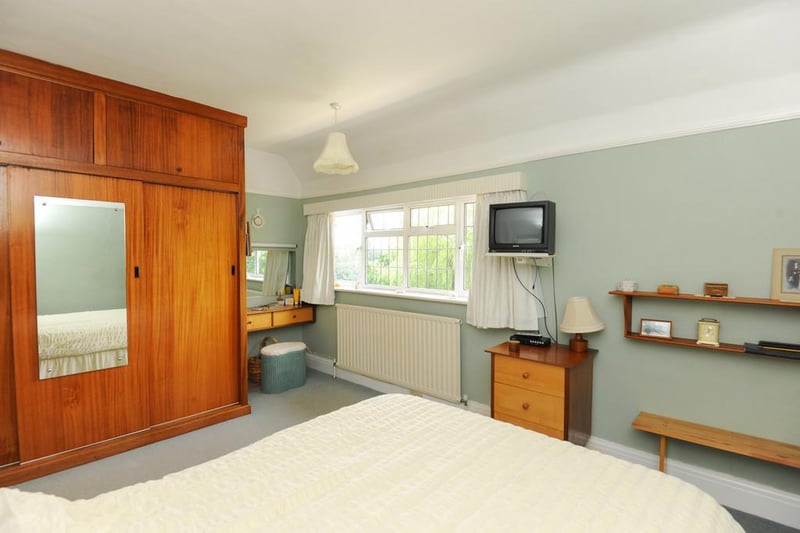 The property boasts three bedrooms, one bathroom and two reception rooms.