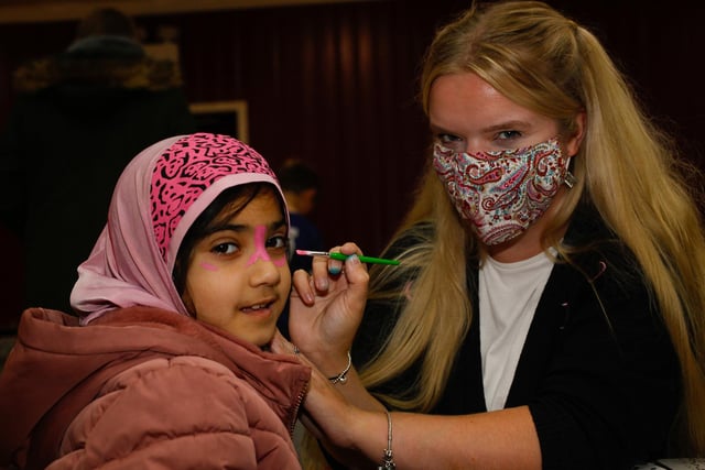 Morgan, of Bairns Community Mobile Creche, took on face painting duties at the Rainbow Muslim Women's Group fun day.