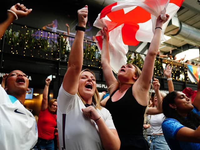 England fans celebrate following a screening of the FIFA Women's World Cup 2023 semi-final at BOXPARK Wembley, London (Photo credit: Victoria Jones/PA Wire)
