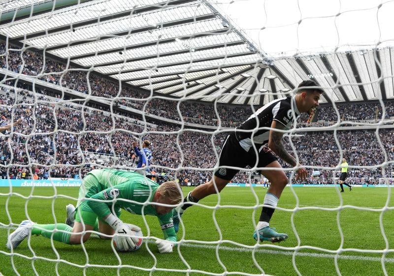Bruno Guimaraes of Newcastle United celebrates after scoring their team’s second goal past Kasper Schmeichel of Leicester City during the Premier League match between Newcastle United and Leicester City.