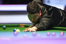 Yan Bingtao plays a shot during day one of the 2022 Cazoo Masters at Alexandra Palace, London.   Kieran Cleeves/PA Wire.