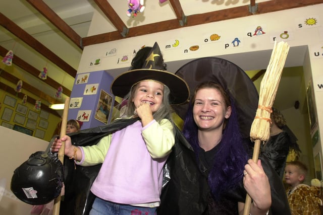 A Tickhill day nursery is celebrating its first birthday. Our picture shows witches  Grace Neary, aged three, and senior nursery nurse Kate Harcourt in 2001