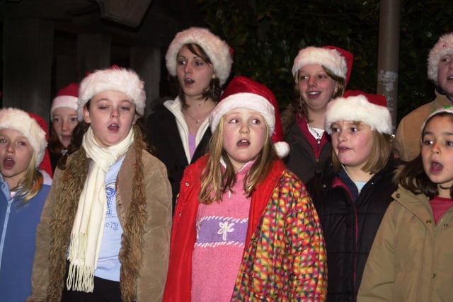 Pictured at the Penistone Christmas lights switch on. Seen singing are children from Penistone  PJ's choir in 2003
