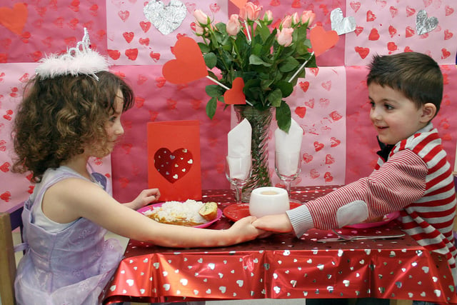 Ella Hutchings, 4,  and Reef Burt, 3, enjoy a cosy Valentine's dinner at the Alton Manor nursery in Belper in 2009.