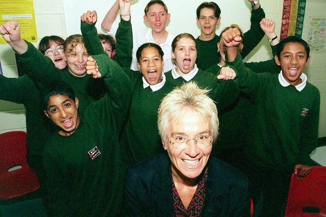 Pictured at Fir Vale School, Earl Marshall Road, Sheffield, where  teacher Jenny Westby, one of the winners  of the Star Teachers Awards, is seen with some of her cheering pupils (September 1999)