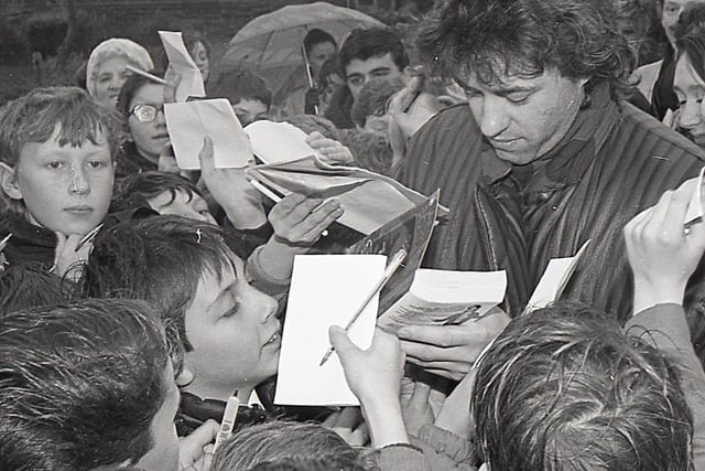 Buxton Advertiser archive, 1986, Bob Geldhof signing autographs at St Thomas More RC School