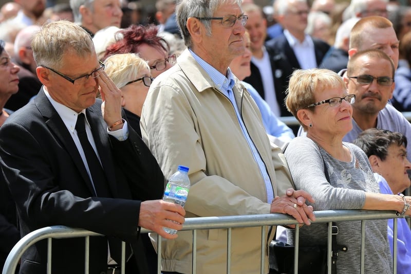 Members of the crowd outside Brendan Ingle's funeral