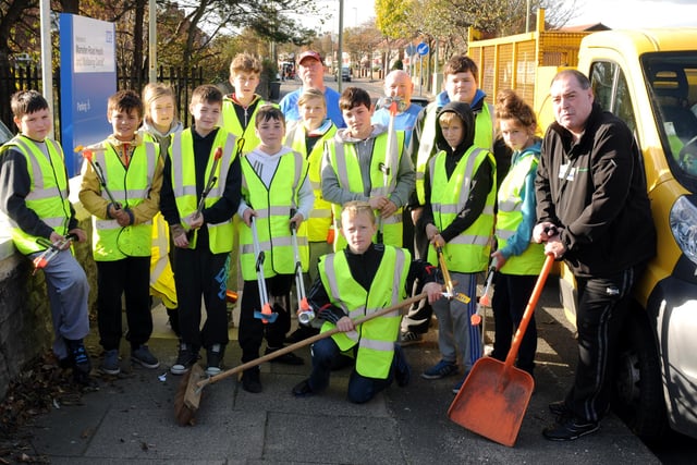 Youngsters took part in a clean up around Horsley Hill as part of the Darker Nights campaign in 2013. Group leader George Pearce is pictured right.