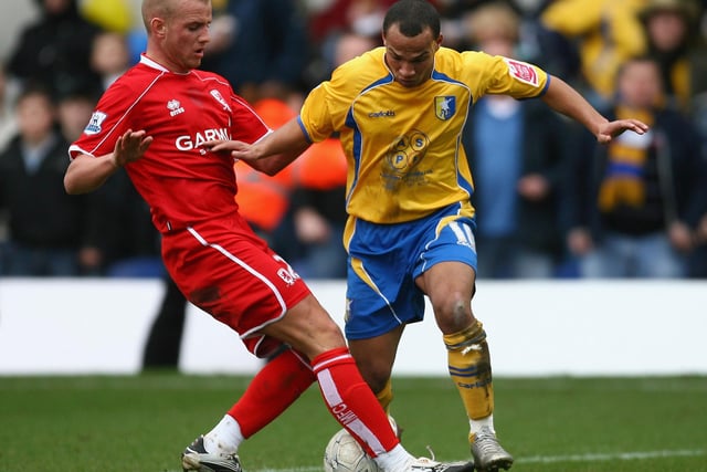 Lee Cattermole tackles Simon Brown.