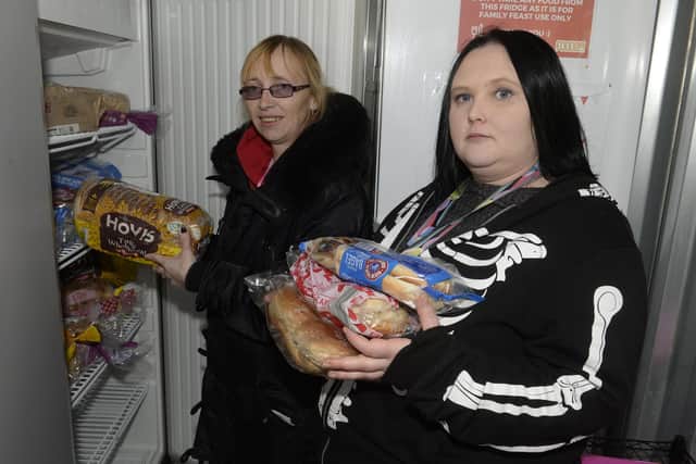 Volunteers at Arbourthorne Primary School's Community Fridge get ready to hand out food to local residents from their facility in the school grounds. Sonia and Heather stock up with loaves of bread