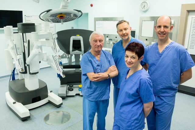 Professor James Catto (far right) with Chief Executive Kirsten Major at the launch of the second Da Vinci X robot in 2019 following a record £1.3m Sheffield Hospitals Charity donation from businessman Dave Allen