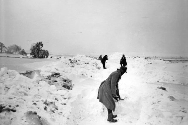 Prisoners of war clearing the snow at Lodge Moor, Sheffield, in 1947