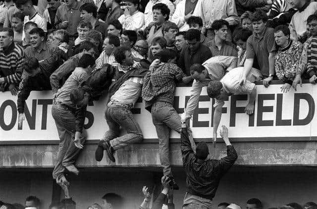 A Liverpool fan who luckily escaped the crush of the Hillsborough Disaster has renewed his appeal to find the pair who swapped their terrace tickets with him outside the stadium that day.