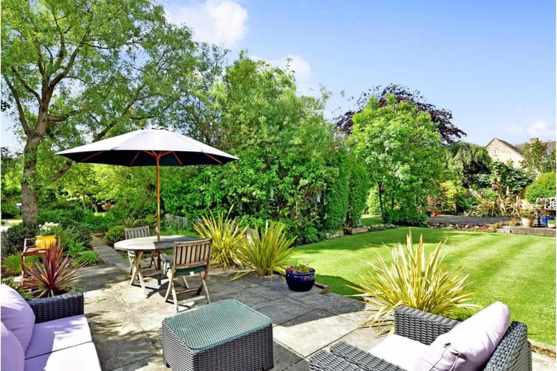 This property has a stunning south facing 1/3 Acre garden plot.