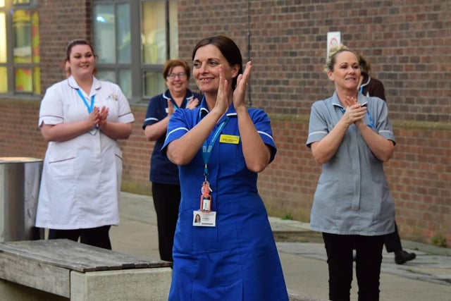 Staff at South Tyneside District Hospital taking part in the Clap For Our Carers.  For 10 weeks during lockdown hospital staff and the public joined together to applaud NHS staff and frontline workers every Thursday night at 8pm. 
Image by North News.