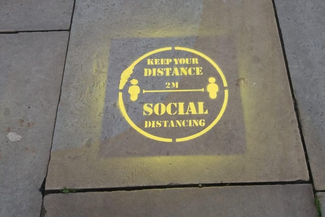 Symbols painted onto the pavement in Alnwick by Northumberland County Council.