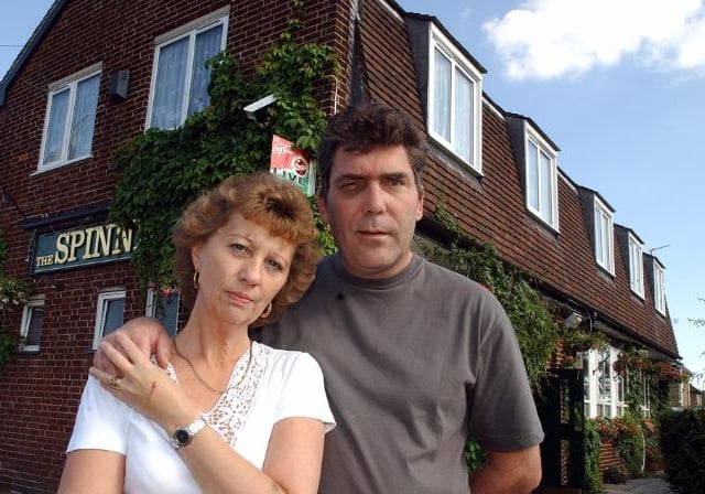 David and Christine Sissions outside of The Spinney Pub in Balby, 2004.
