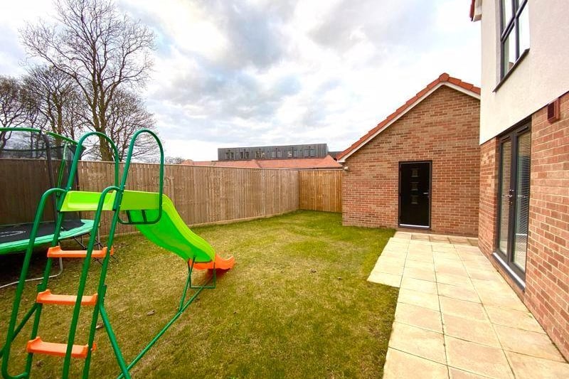 This home has great garden space to keep the kids busy in the summer.