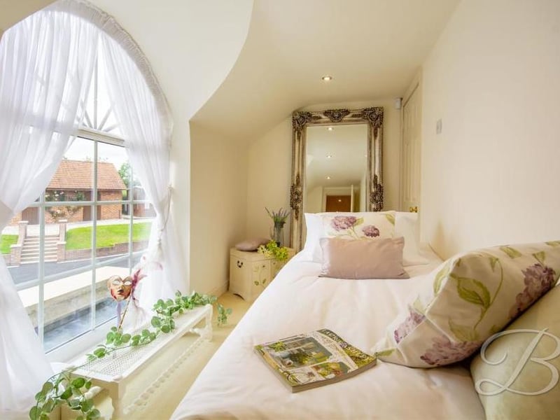 An unusual shape it might be, but still a delightful fifth bedroom. And it comes with a lovely view every morning.