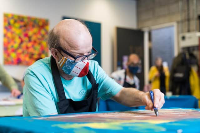 An artist taking part in an ArtworksTogether project
